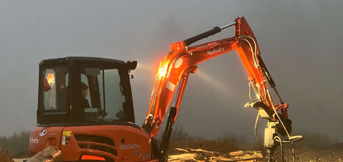 R2's orange excavator at first light